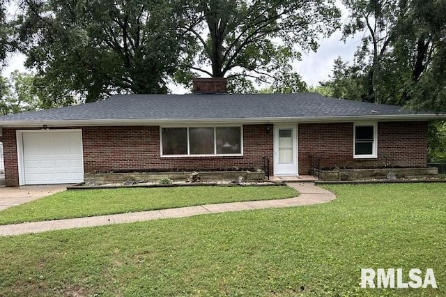 ranch-style house with a garage and a front lawn