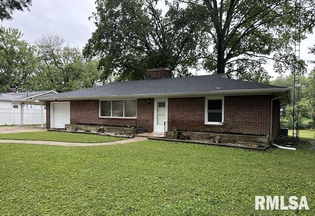 ranch-style home with a front yard