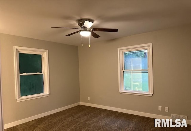 carpeted empty room with ceiling fan