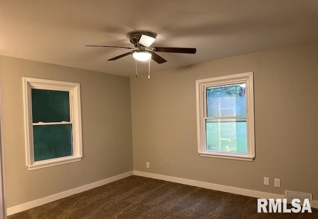 carpeted empty room with ceiling fan