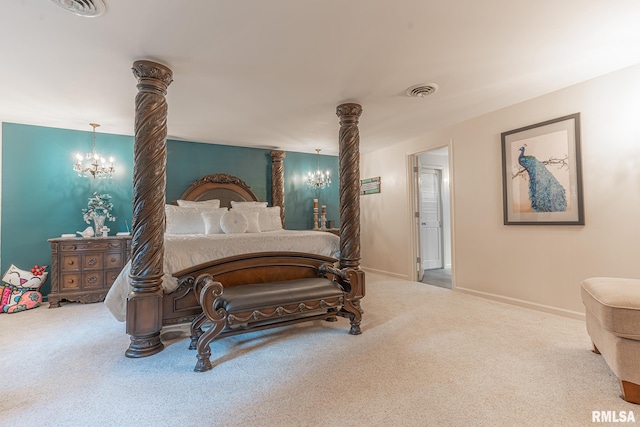 bedroom with a chandelier and carpet flooring