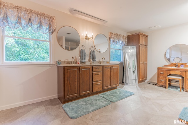 bathroom featuring double sink vanity