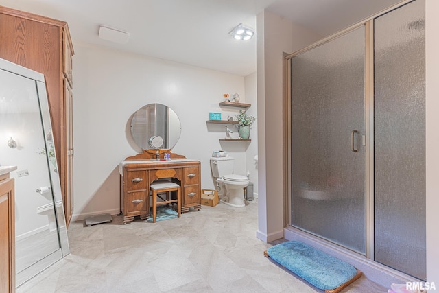 bathroom featuring a shower with door, toilet, tile patterned floors, and vanity