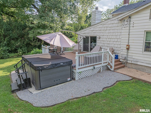 view of patio featuring a wooden deck and a hot tub