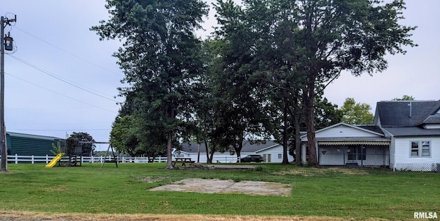 view of yard with a playground