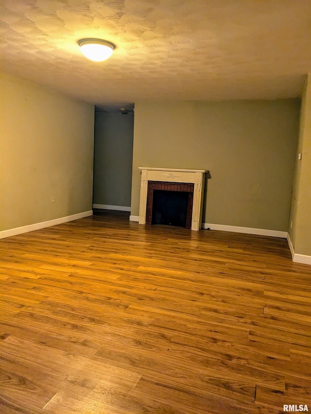 unfurnished living room featuring light wood-type flooring