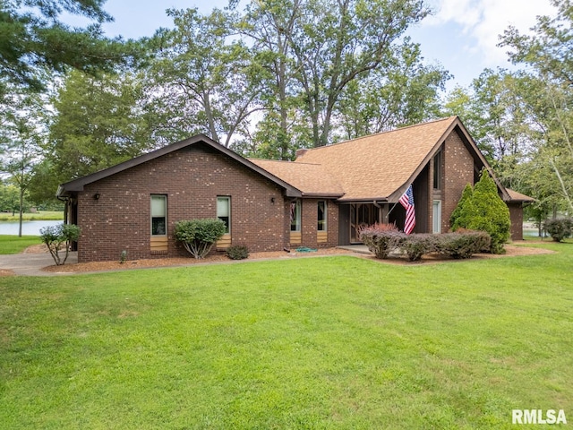 ranch-style house with a front yard