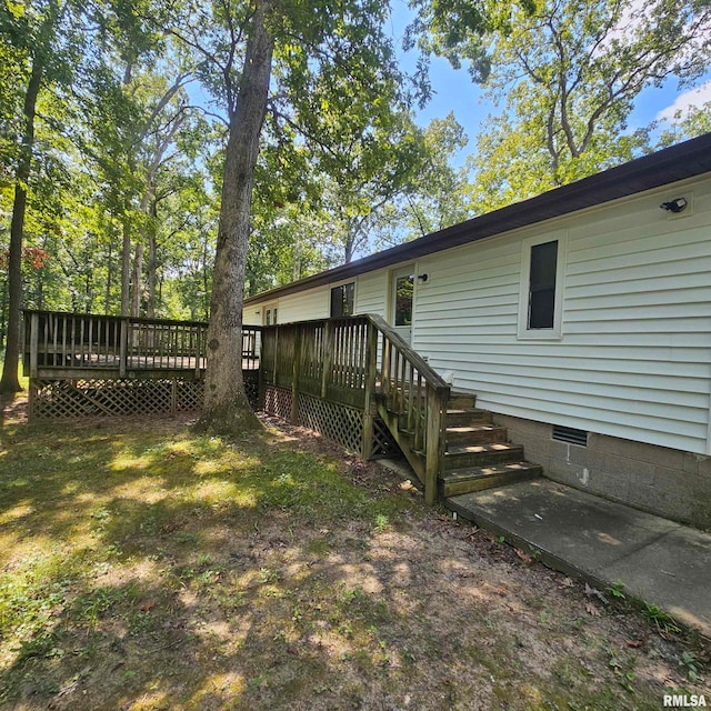 rear view of house with a deck