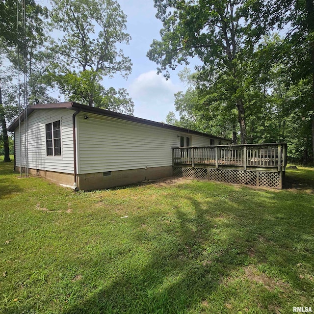 view of yard with a deck