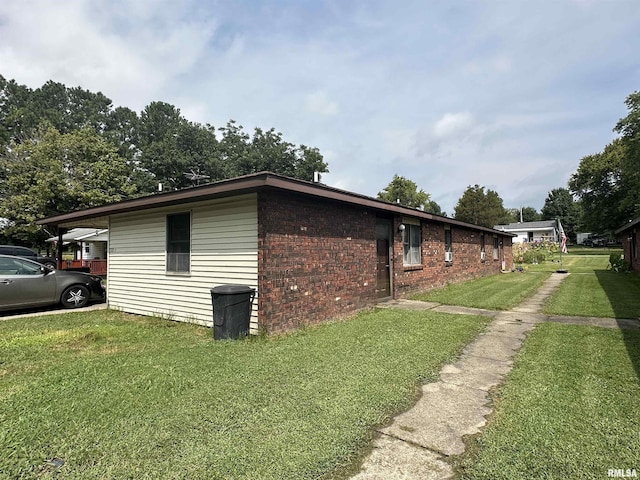 2202 Illinois Ave Unit 3 & 4, Murphysboro, IL 62966 - view of home's exterior with a yard and brick siding