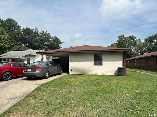 ranch-style house with a carport and a front lawn