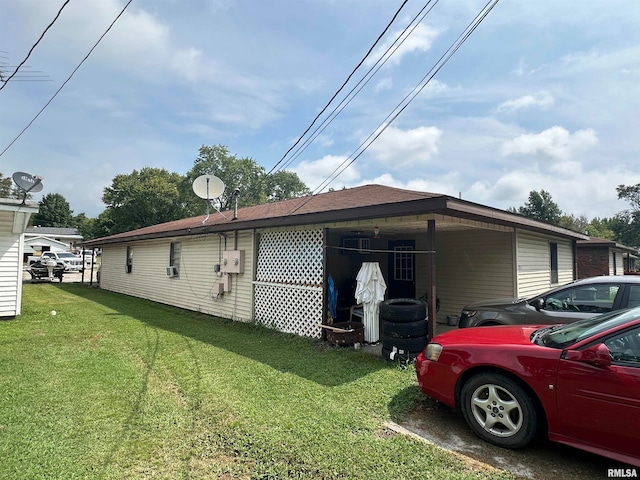 view of property exterior with a lawn