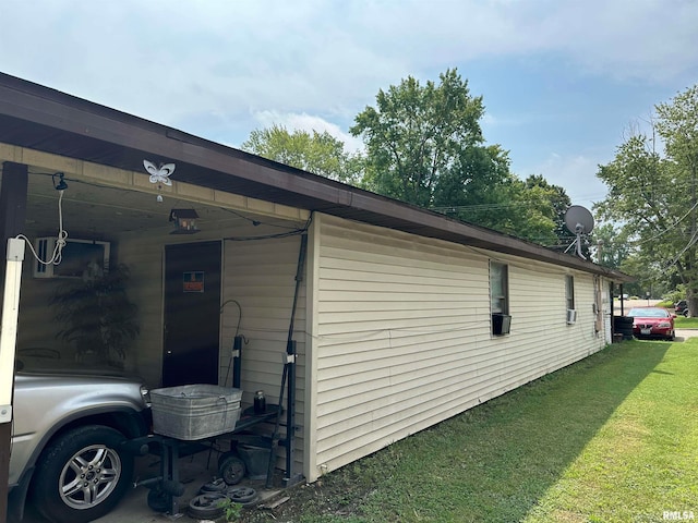 view of property exterior with a yard