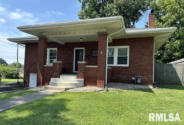 bungalow with a front yard