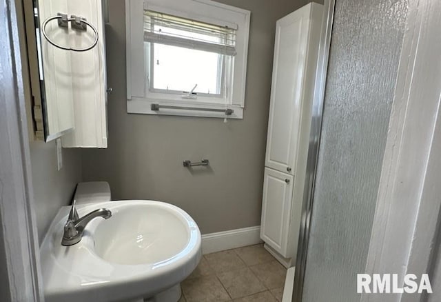 bathroom featuring sink and tile patterned floors