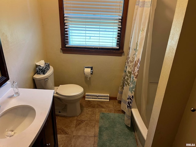 full bathroom featuring toilet, shower / bathtub combination with curtain, tile patterned flooring, and vanity