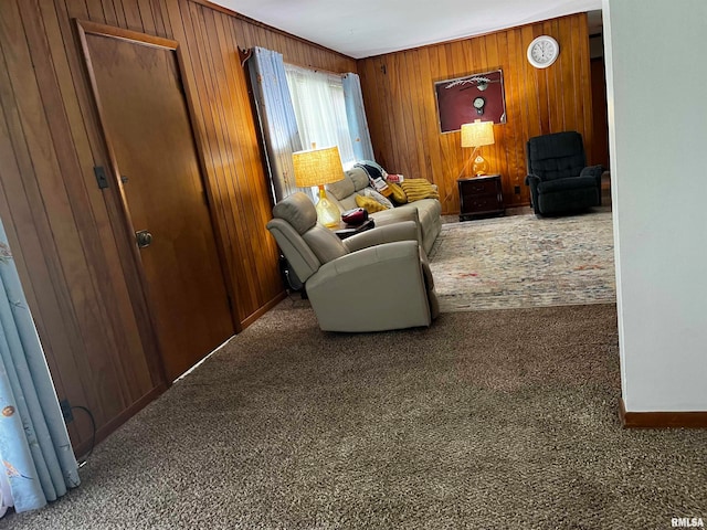 living room featuring carpet floors and wooden walls