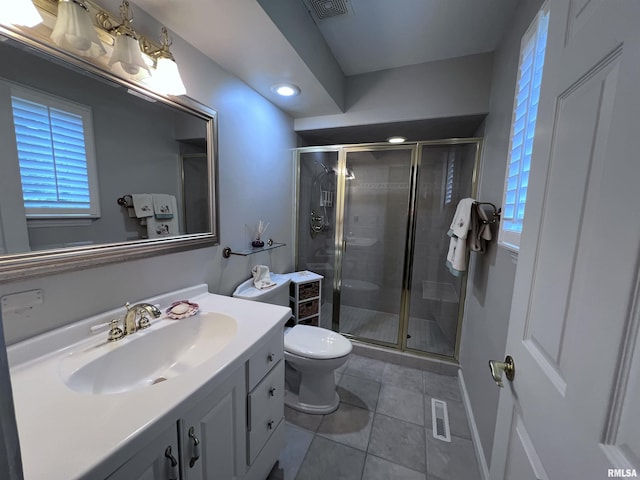 bathroom featuring tile patterned flooring, visible vents, a shower stall, and vanity