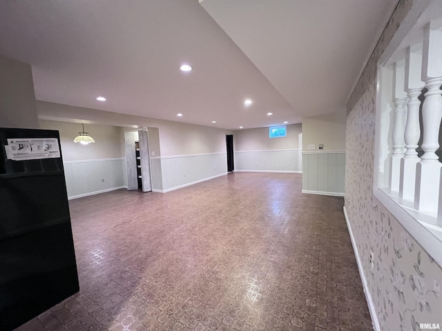 interior space with recessed lighting and wainscoting