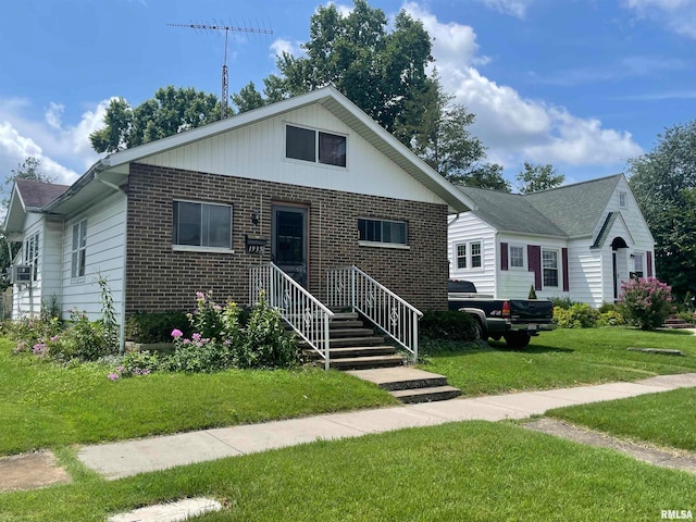 view of front of property with a front lawn