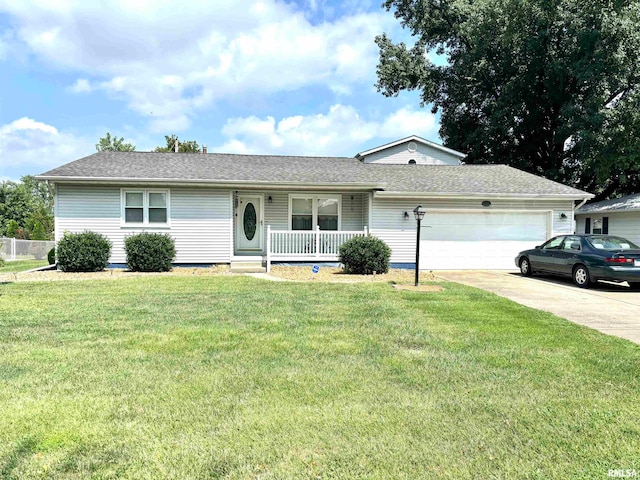 single story home with a porch, a front lawn, and a garage