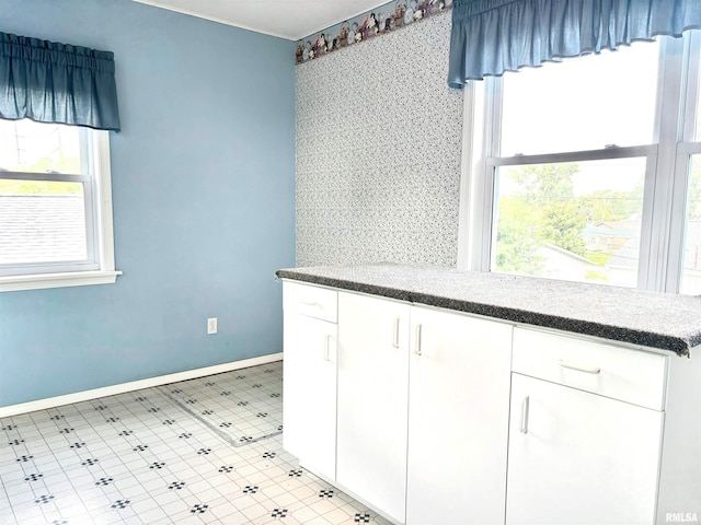 kitchen featuring white cabinetry