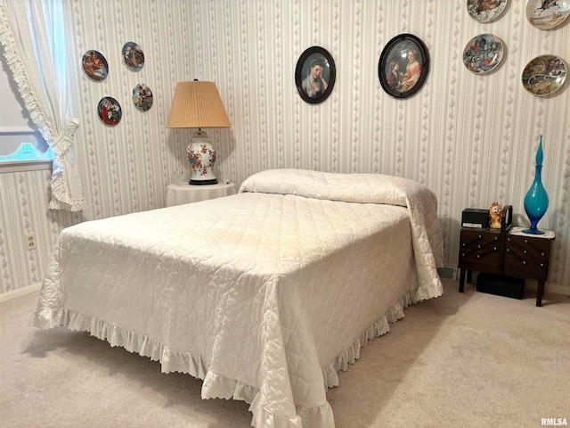 bedroom with light carpet