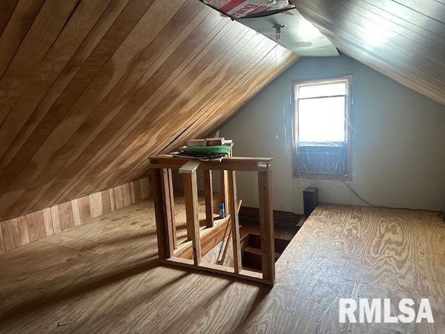 bonus room featuring vaulted ceiling and wooden ceiling