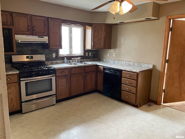 kitchen featuring backsplash, ceiling fan, sink, dishwasher, and stainless steel gas stove