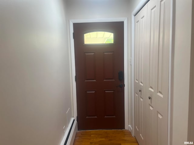 entryway with hardwood / wood-style floors