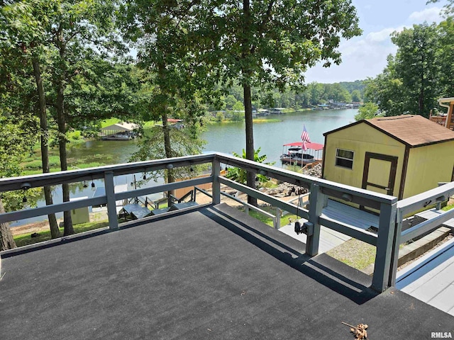 balcony with a deck with water view