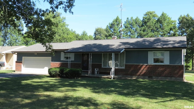 ranch-style house featuring a garage and a front lawn