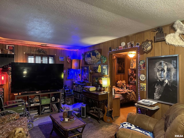 5281-5287 Country Club Rd Unit 2, Murphysboro, IL 62966 - carpeted living area with a textured ceiling and wood walls
