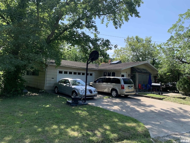 5281-5287 Country Club Rd Unit 2, Murphysboro, IL 62966 - ranch-style home with an attached garage, concrete driveway, and a front lawn