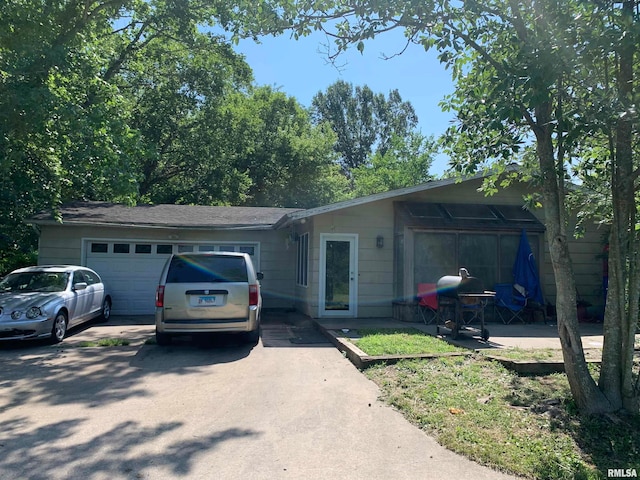 single story home with a garage