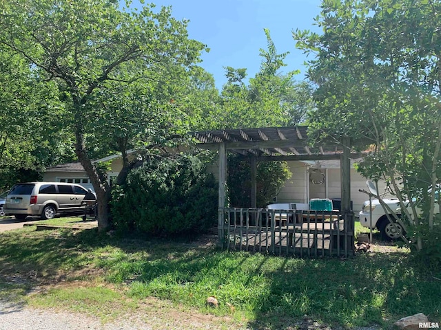 view of front of house with a pergola