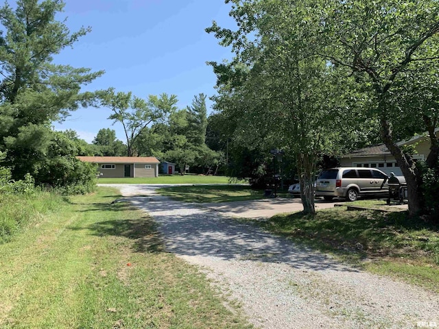 view of road with driveway