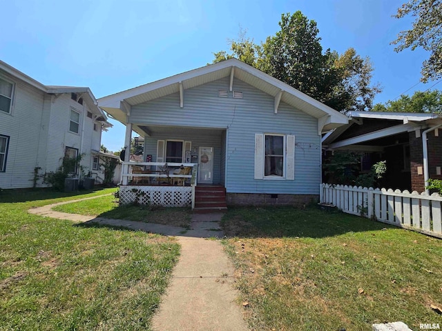 view of front of home with a front lawn