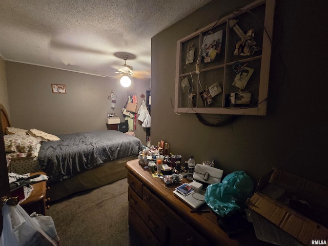 carpeted bedroom with a textured ceiling and ceiling fan