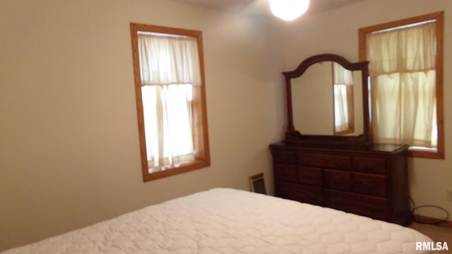 bedroom with visible vents