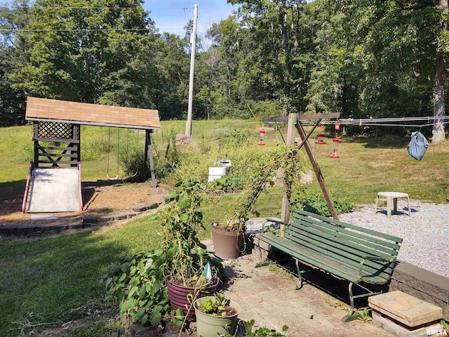 view of home's community with a lawn