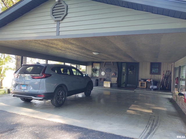 garage featuring wooden walls