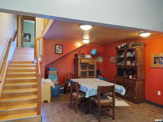 dining room featuring wooden ceiling