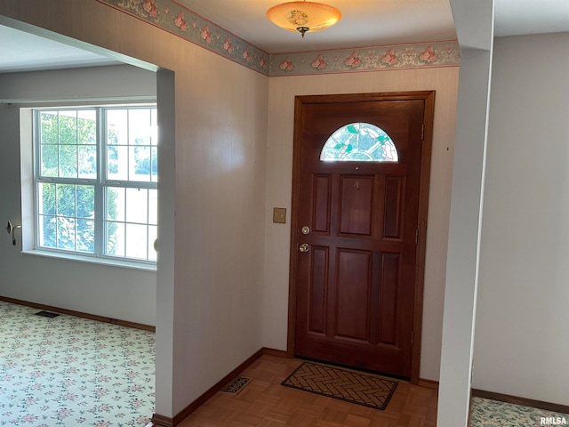 foyer entrance with light parquet floors