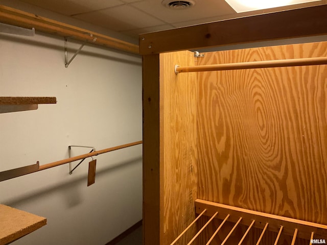 spacious closet featuring a paneled ceiling