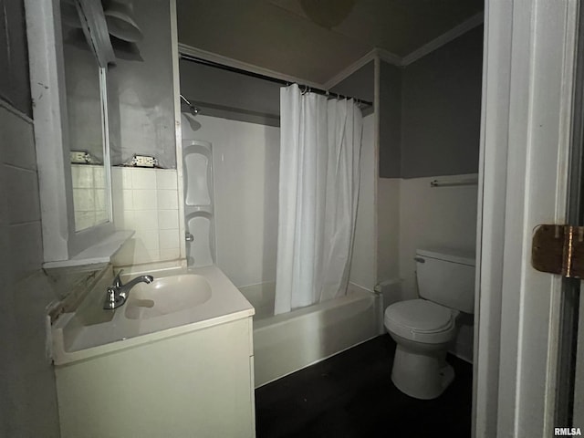 full bathroom with vanity, toilet, and shower / tub combo with curtain