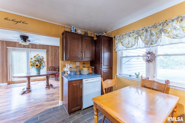 25 Lees Dr, Creal Springs, IL 62922 - kitchen with dark wood finished floors, white dishwasher, wood walls, a ceiling fan, and crown molding