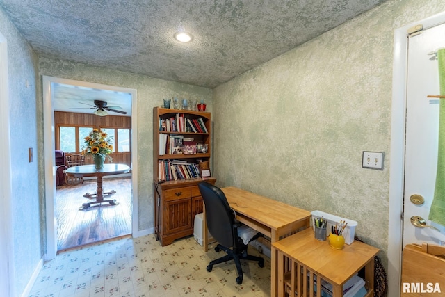 25 Lees Dr, Creal Springs, IL 62922 - office with light floors, baseboards, a ceiling fan, and a textured wall