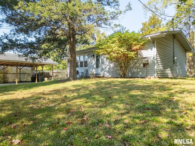 view of yard featuring a carport