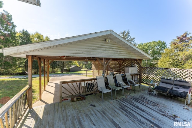 25 Lees Dr, Creal Springs, IL 62922 - wooden deck with an outbuilding and a storage shed